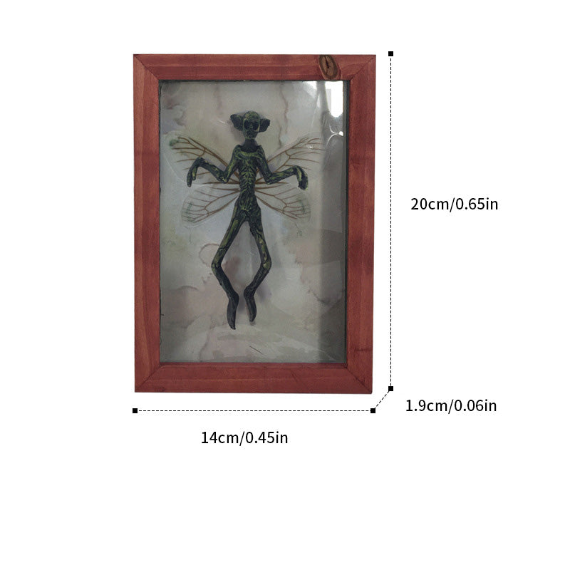 Mysterious Mummified Fairy in Frame