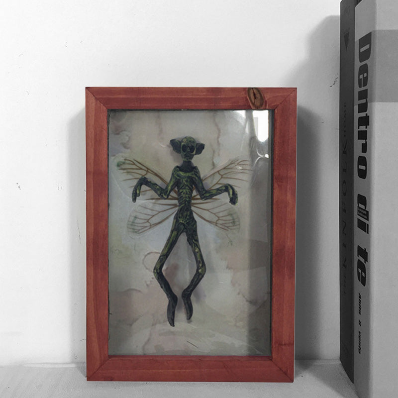 Mysterious Mummified Fairy in Frame